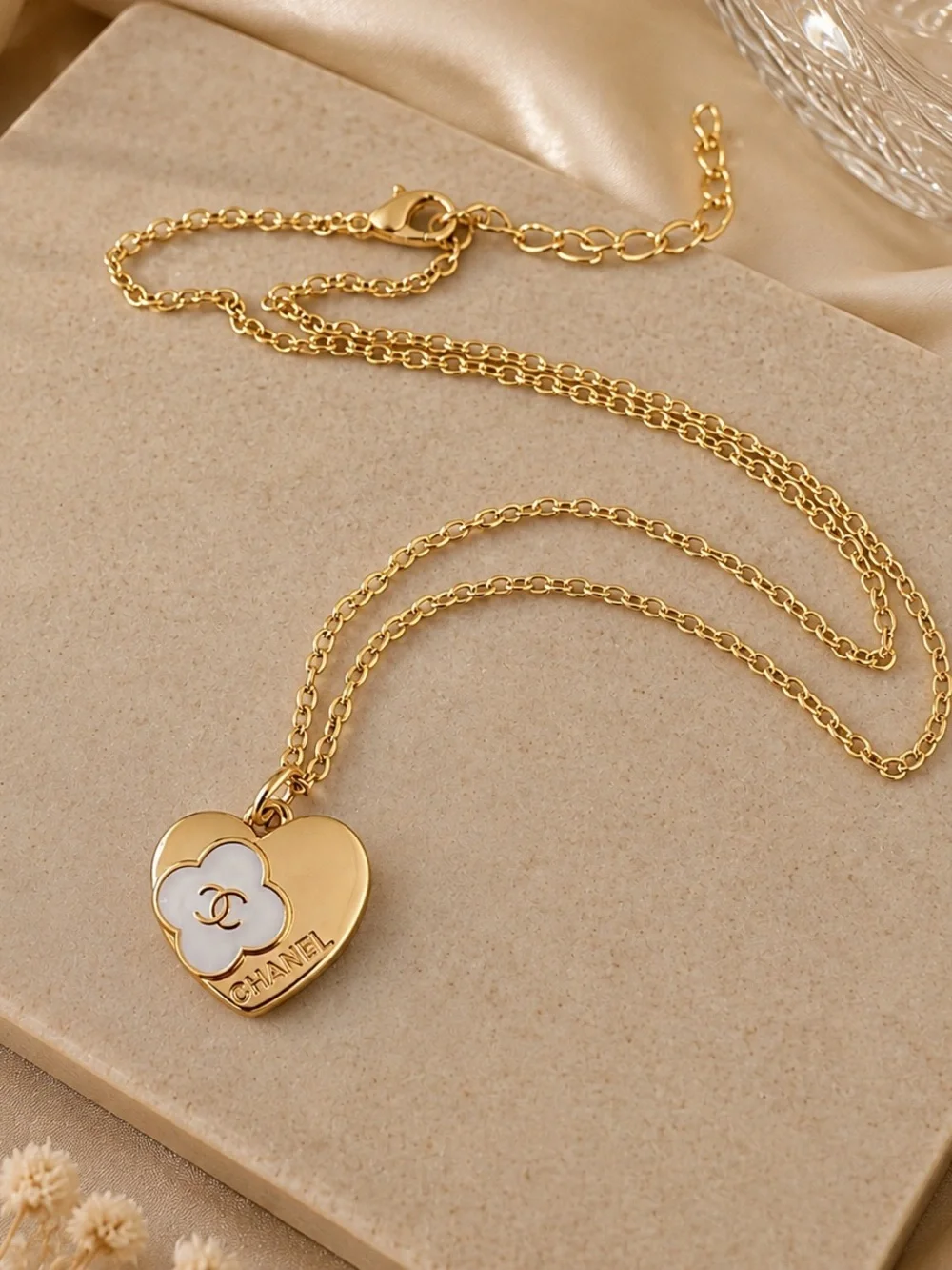Gold Heart Pendant Necklace with White Floral Detail